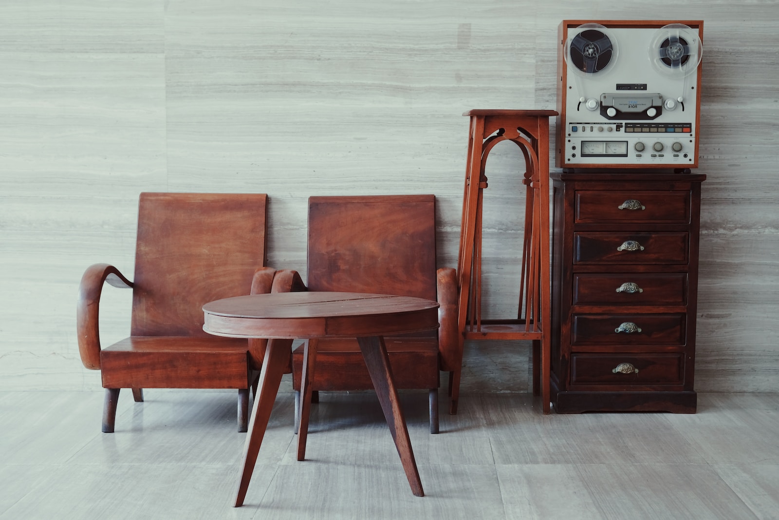 brown wooden chairs, table, and cabinet